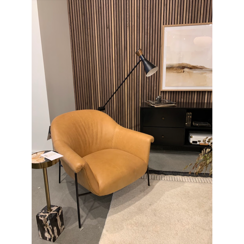 With a curvy silhouette and classic rolled arms, this Suerte Chair - Palermo Butterscotch has butterscotch leather that lends a fresh feel to vintage-inspired accent seating. The airy iron cradle base brings a beautiful balance of scale to any living room or office! Amethyst Home provides interior design, new home construction design consulting, vintage area rugs, and lighting in the Park City metro area.