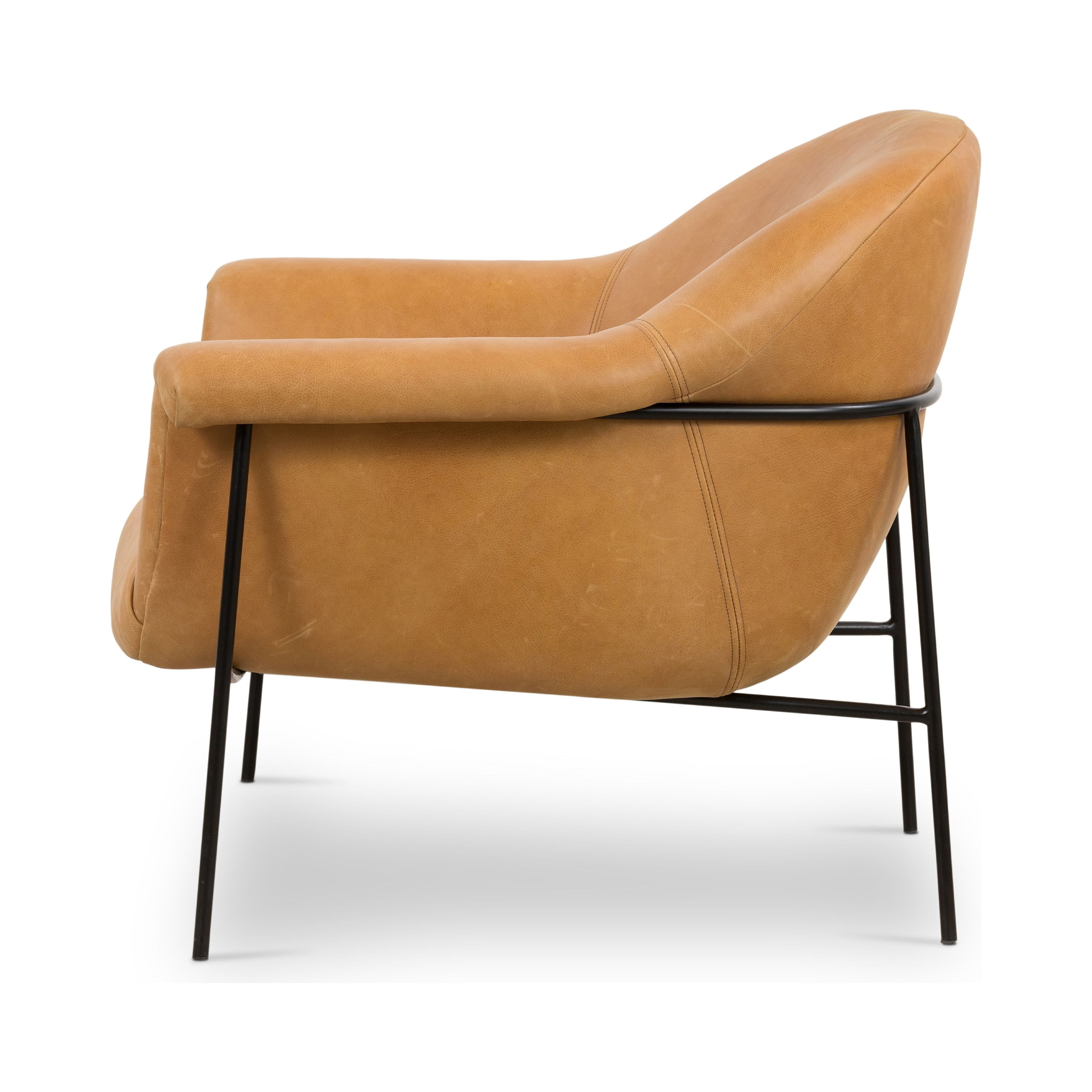 With a curvy silhouette and classic rolled arms, this Suerte Chair - Palermo Butterscotch has butterscotch leather that lends a fresh feel to vintage-inspired accent seating. The airy iron cradle base brings a beautiful balance of scale to any living room or office!  Overall Dimensions: 35.00"w x 33.50"d x 31.00"h