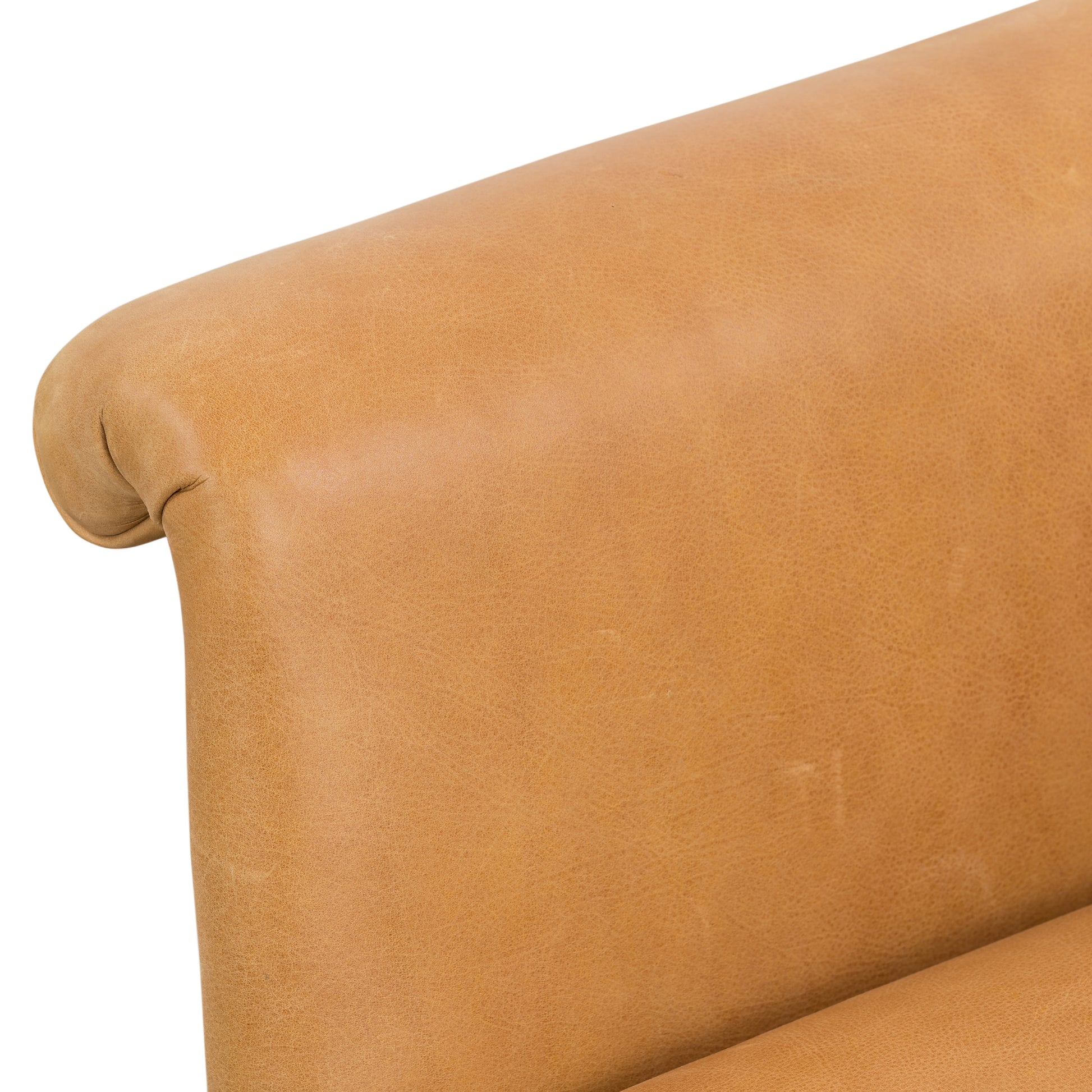 With a curvy silhouette and classic rolled arms, this Suerte Chair - Palermo Butterscotch has butterscotch leather that lends a fresh feel to vintage-inspired accent seating. The airy iron cradle base brings a beautiful balance of scale to any living room or office!  Overall Dimensions: 35.00"w x 33.50"d x 31.00"h