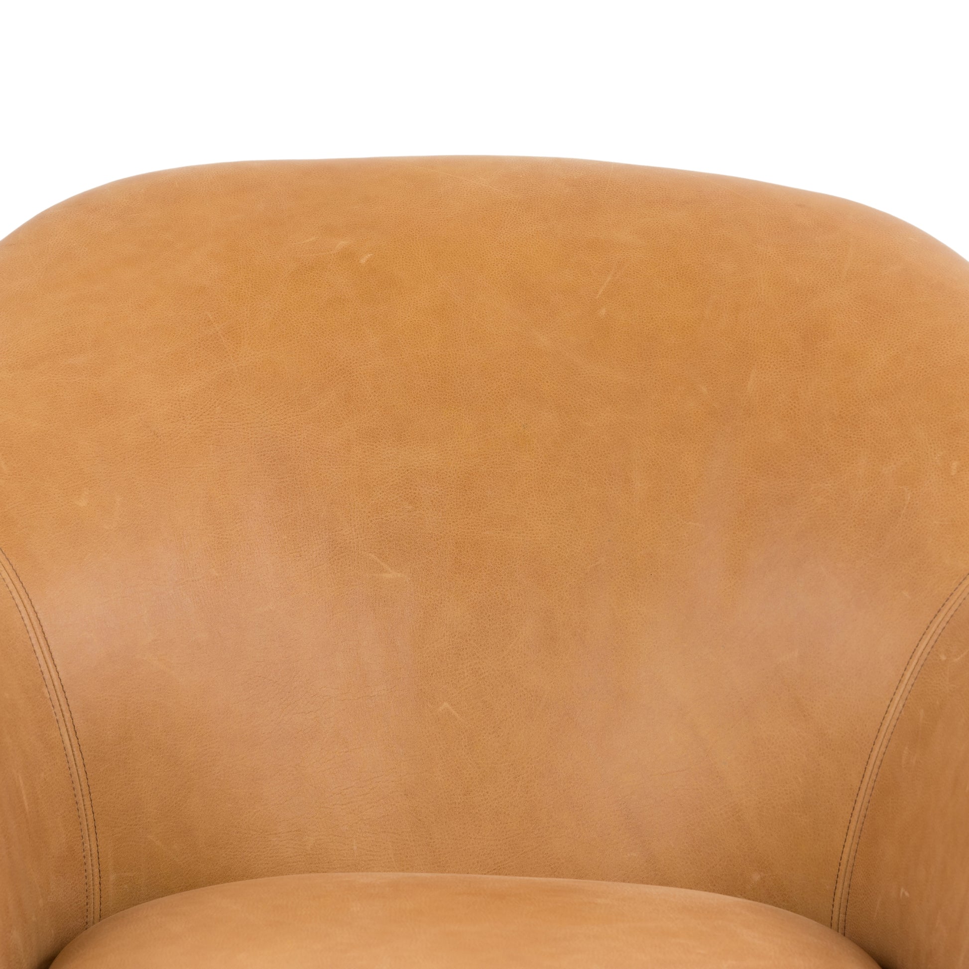With a curvy silhouette and classic rolled arms, this Suerte Chair - Palermo Butterscotch has butterscotch leather that lends a fresh feel to vintage-inspired accent seating. The airy iron cradle base brings a beautiful balance of scale to any living room or office!  Overall Dimensions: 35.00"w x 33.50"d x 31.00"h