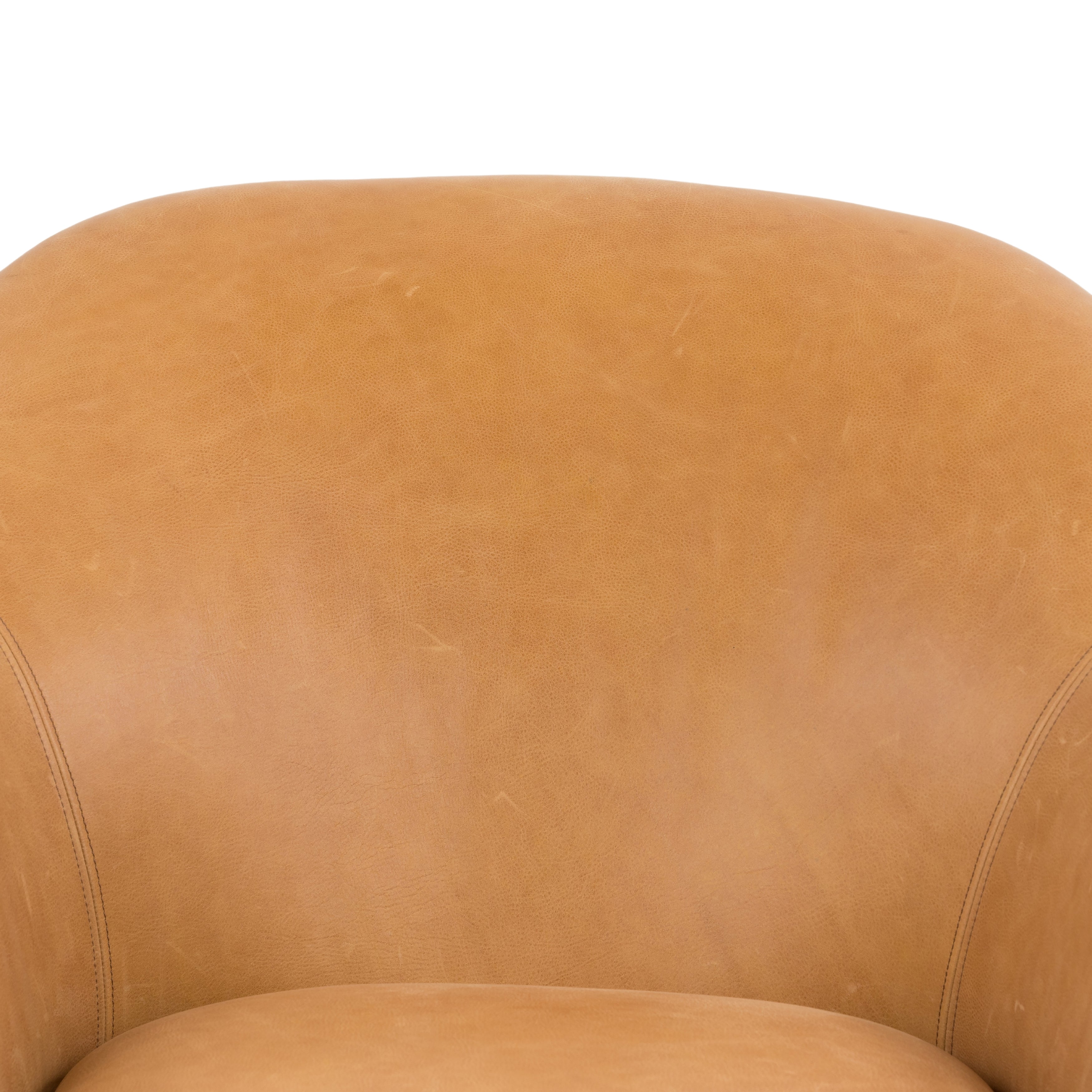 With a curvy silhouette and classic rolled arms, this Suerte Chair - Palermo Butterscotch has butterscotch leather that lends a fresh feel to vintage-inspired accent seating. The airy iron cradle base brings a beautiful balance of scale to any living room or office!  Overall Dimensions: 35.00"w x 33.50"d x 31.00"h
