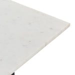 Featuring Terrell Console Table - Raw Black by Four Hands at Amethyst Home. Finished in a raw black, uniquely angular cast aluminum legs, this Terrell Console Table - Raw Black showcases a rectangular tabletop of solid marble in a clean, polished white. We'd love to see this in an entryway or behind a sofa. 
Overall Dimensions: 51"W x 17"L x 31.25"H
Colors.  Amethyst Home provides interior design, new home construction design consulting, vintage area rugs, and lighting in the Park City metro area.