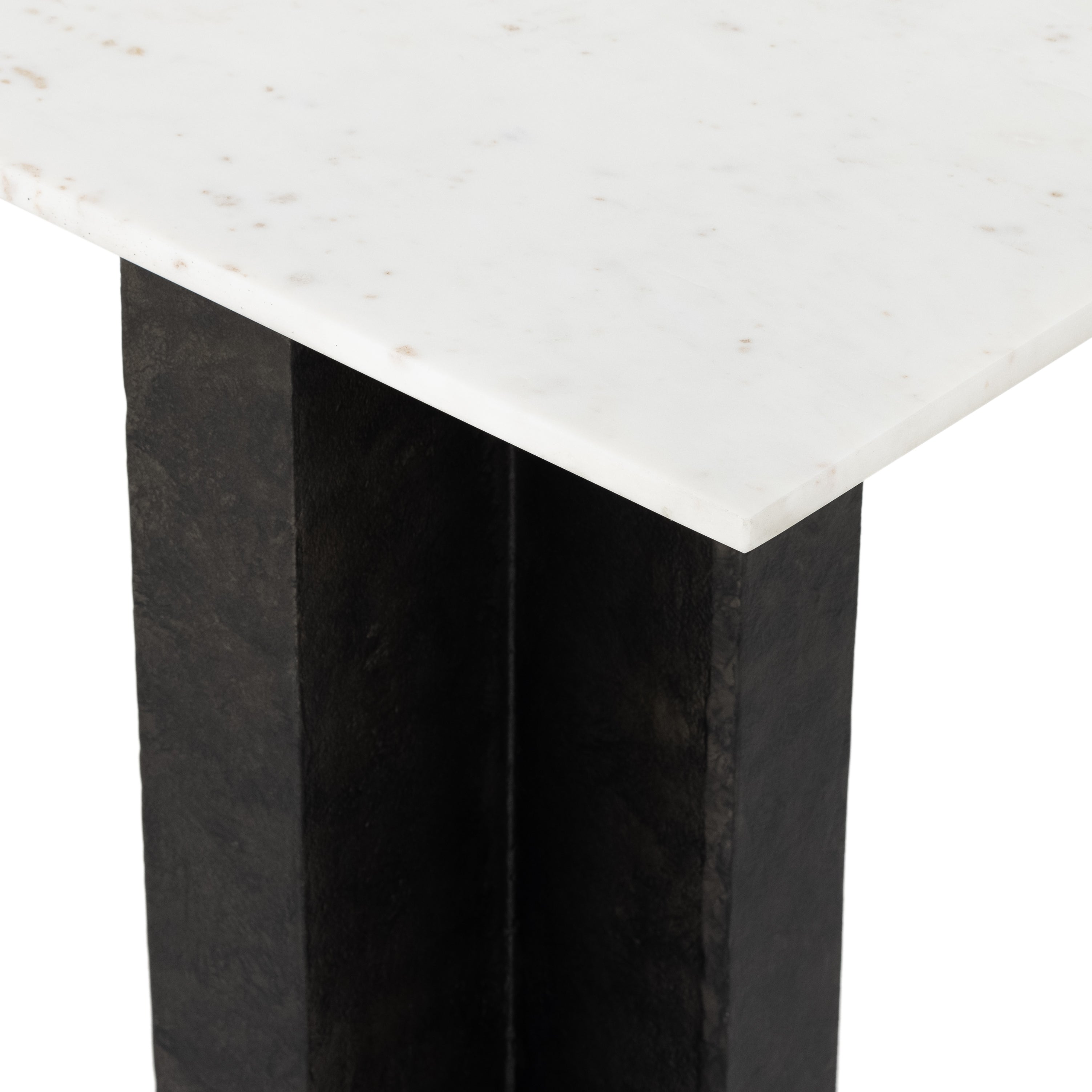 Finished in a raw black, uniquely angular cast aluminum legs, this Terrell Console Table - Raw Black showcases a rectangular tabletop of solid marble in a clean, polished white. We'd love to see this in an entryway or behind a sofa.   Overall Dimensions: 51.00"w x 17.00"d x 31.25"h