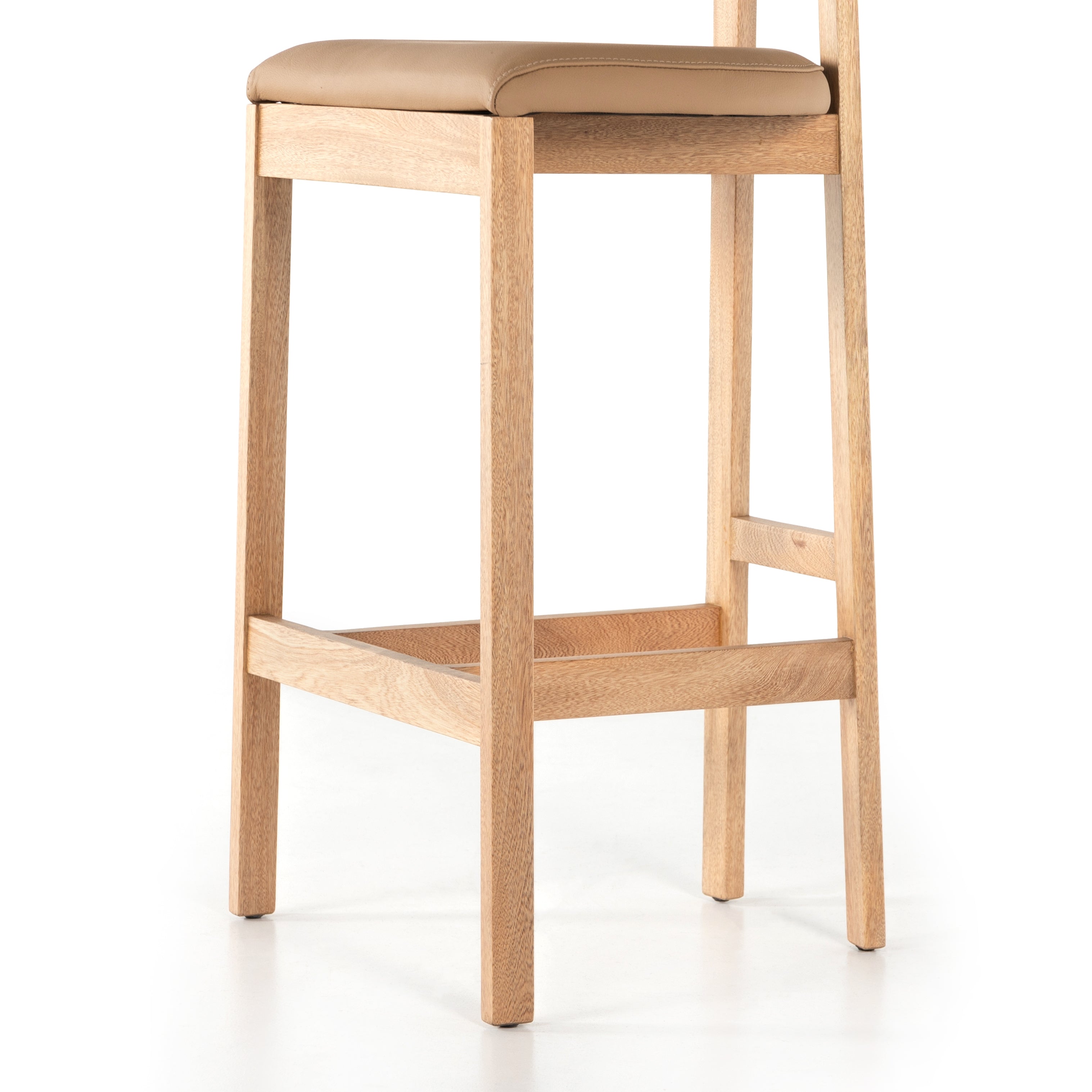 Featuring Tex Bar + Counter Stool by Four Hands at Amethyst Home. Solid Rosa Morada forms a T-shape frame on this Tex Bar + Counter Stool. The light tan top-grain leather seating is so comfy -- a perfectly sized stool for your kitchen island or bar area. 
Bar Stool Overall Dimensions: 20.25"W x 17.75"L x 40.50"HSeat Depth: 16"Seat Height: 30"
Counter St.  Amethyst Home provides interior design, new home construction design consulting, vintage area rugs, and lighting in the Laguna Beach metro area.