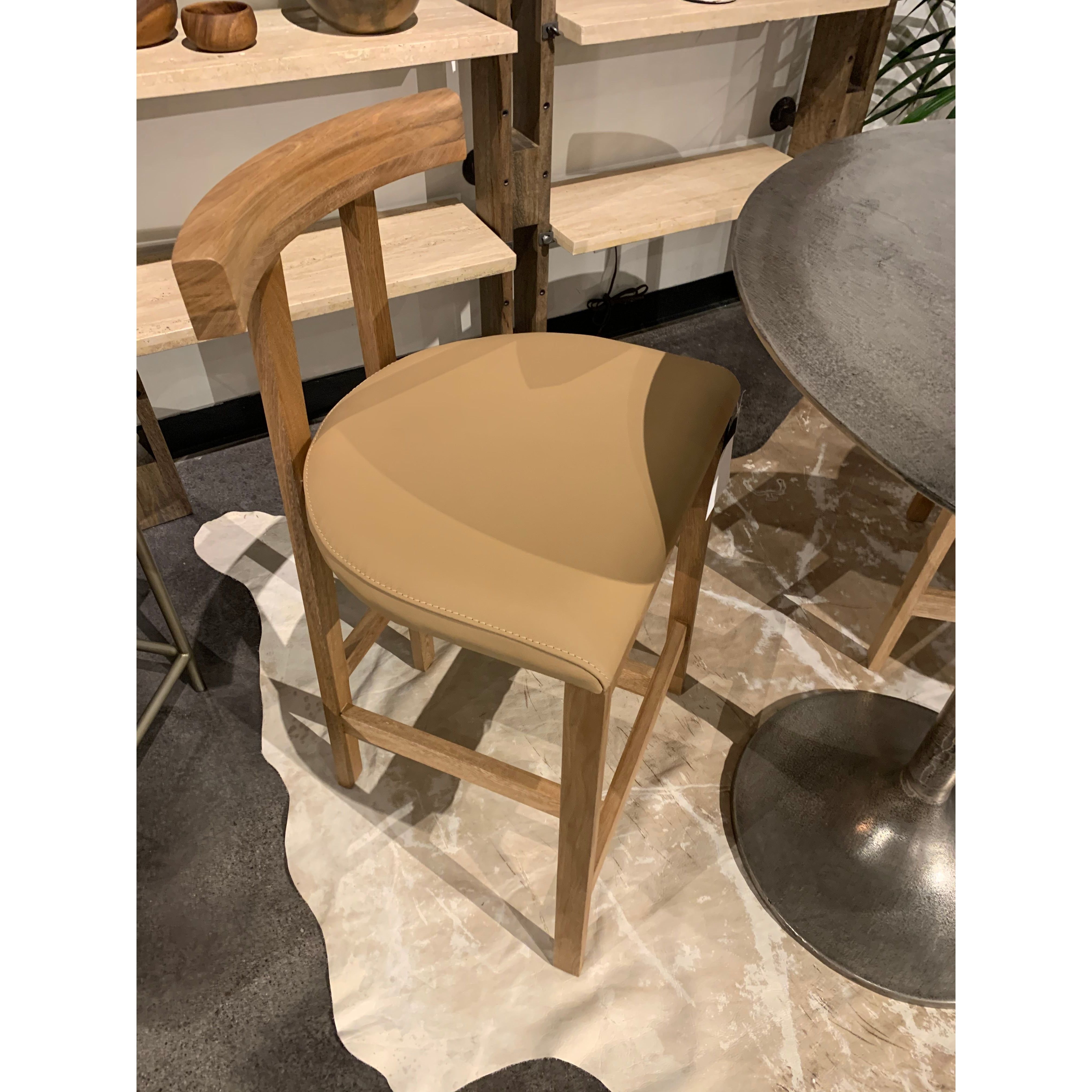 Featuring Tex Bar + Counter Stool by Four Hands at Amethyst Home. Solid Rosa Morada forms a T-shape frame on this Tex Bar + Counter Stool. The light tan top-grain leather seating is so comfy -- a perfectly sized stool for your kitchen island or bar area. 
Bar Stool Overall Dimensions: 20.25"W x 17.75"L x 40.50"HSeat Depth: 16"Seat Height: 30"
Counter S.  Amethyst Home provides interior design, new home construction design consulting, vintage area rugs, and lighting in the Newport Beach metro area.