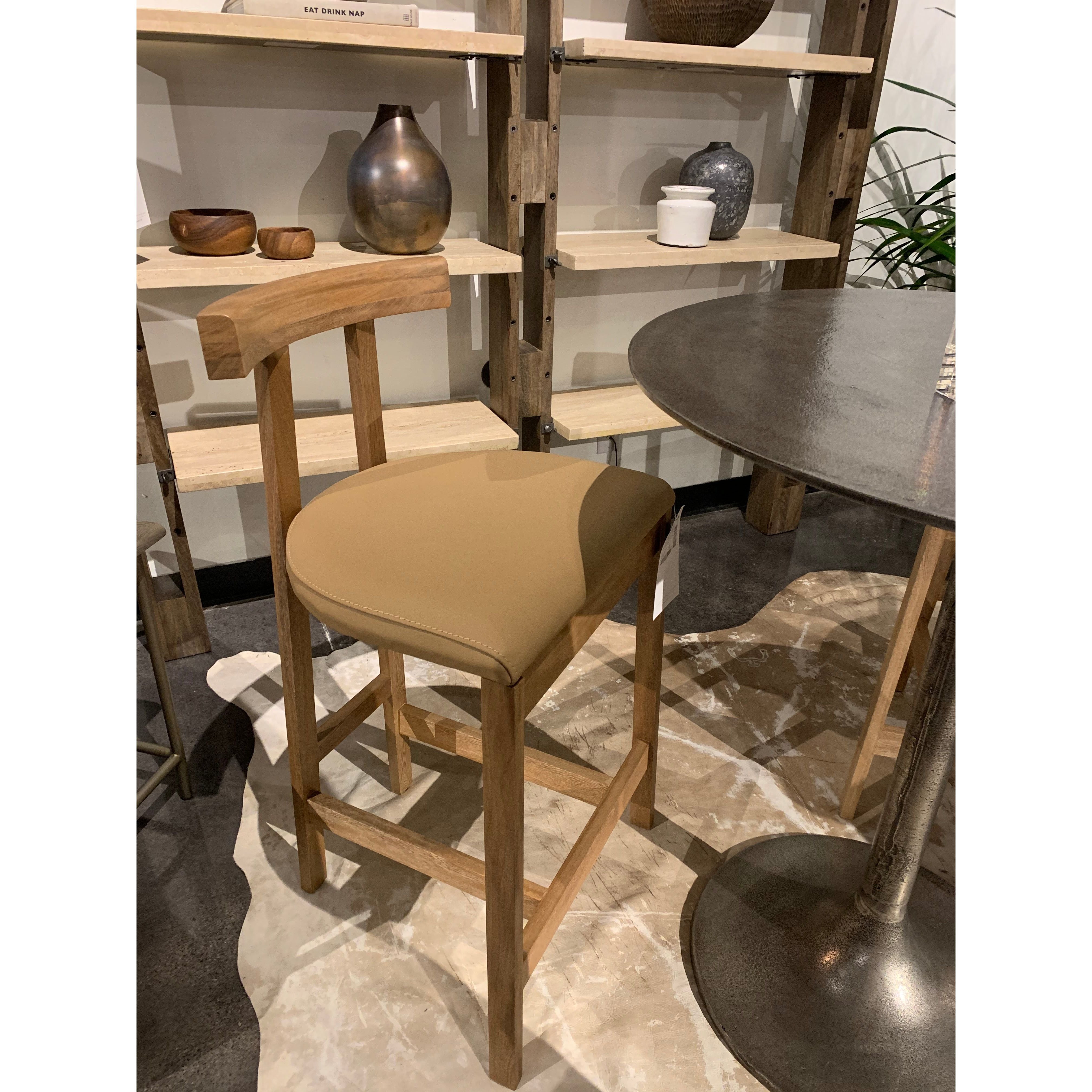 Featuring Tex Bar + Counter Stool by Four Hands at Amethyst Home. Solid Rosa Morada forms a T-shape frame on this Tex Bar + Counter Stool. The light tan top-grain leather seating is so comfy -- a perfectly sized stool for your kitchen island or bar area. 
Bar Stool Overall Dimensions: 20.25"W x 17.75"L x 40.50"HSeat Depth: 16"Seat Height: 30"
Counter Stool .  Amethyst Home provides interior design, new home construction design consulting, vintage area rugs, and lighting in the Portland metro area.