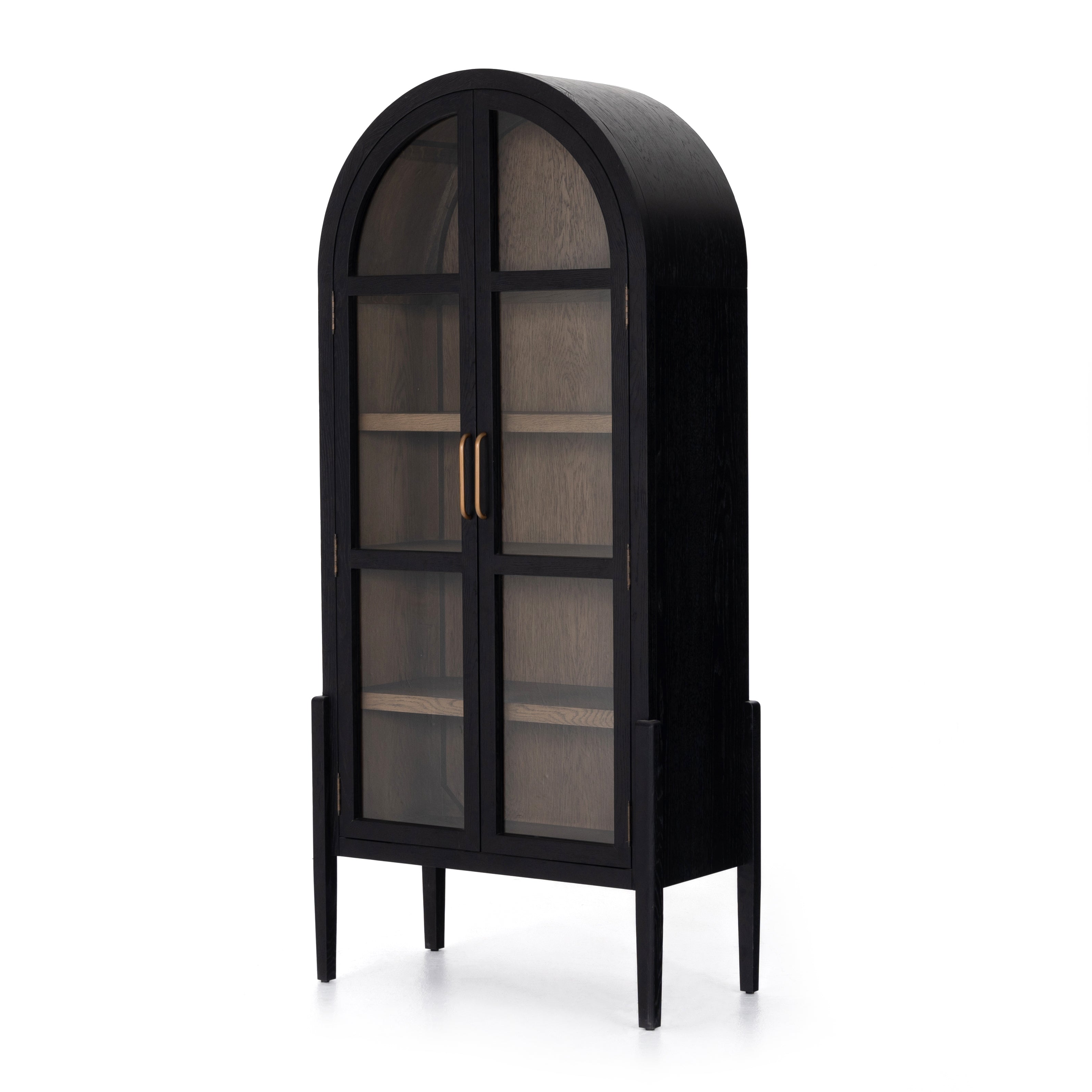Store it in style with this Tolle Cabinet - Drifted Oak. Beautifully shaped cabinetry of black solid oak features spacious interior shelving and clear glass front, ready for displaying favorite books, photos and treasures in any room!  Overall Dimensions: 38.00"w x 19.00"d x 84.00"h