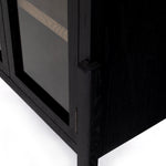 Store it in style with this Tolle Cabinet - Drifted Oak. Beautifully shaped cabinetry of black solid oak features spacious interior shelving and clear glass front, ready for displaying favorite books, photos and treasures in any room!  Overall Dimensions: 38.00"w x 19.00"d x 84.00"h
