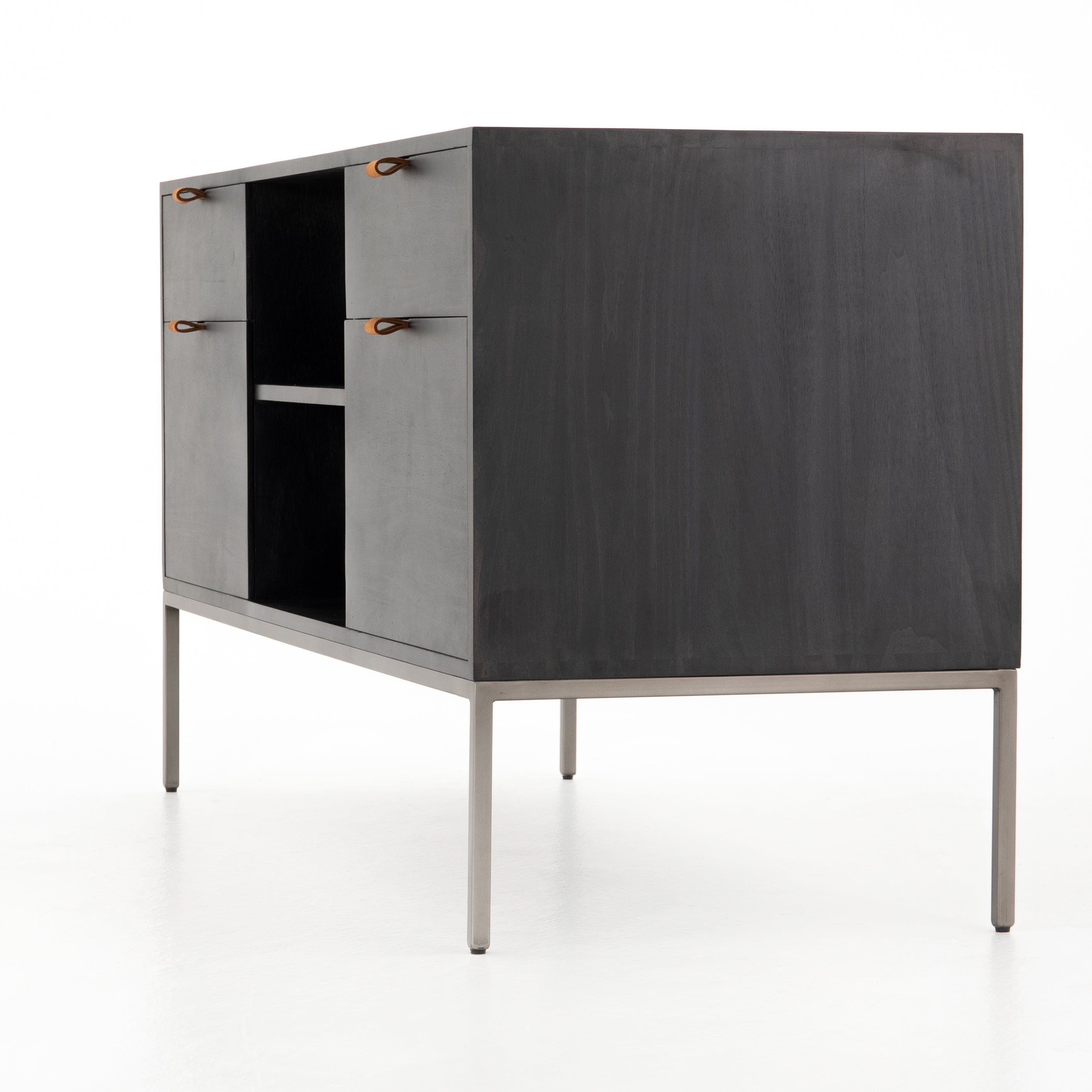 Featuring Trey Modular Filing Credenza - Black Poplar by Four Hands at Amethyst Home. Inspired by clean mid-century design, this Trey Modular Filing Credenza - Black Poplar brings generous storage space to the modern office, with a fully finished back pus metal-secured leather pulls for an element of surprise. Great solo or paired with matching desk or .  Amethyst Home provides interior design, new home construction design consulting, vintage area rugs, and lighting in the Laguna Beach metro area.