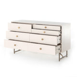 Featuring Van 7 Drawer Dresser - Matte Alabaster by Four Hands at Amethyst Home. This Van 7 Drawer Dresser - Matte Alabaster is finished in a dreamy off-white and aged-brass finished hardware to finish the look. This features five spacious drawers and two smaller velvet-lined drawers perfect for storing your favorite jewelry. 
Overall Dimensions: 58"W x 19".  Amethyst Home provides interior design, new home construction design consulting, vintage area rugs, and lighting in the Portland metro area.