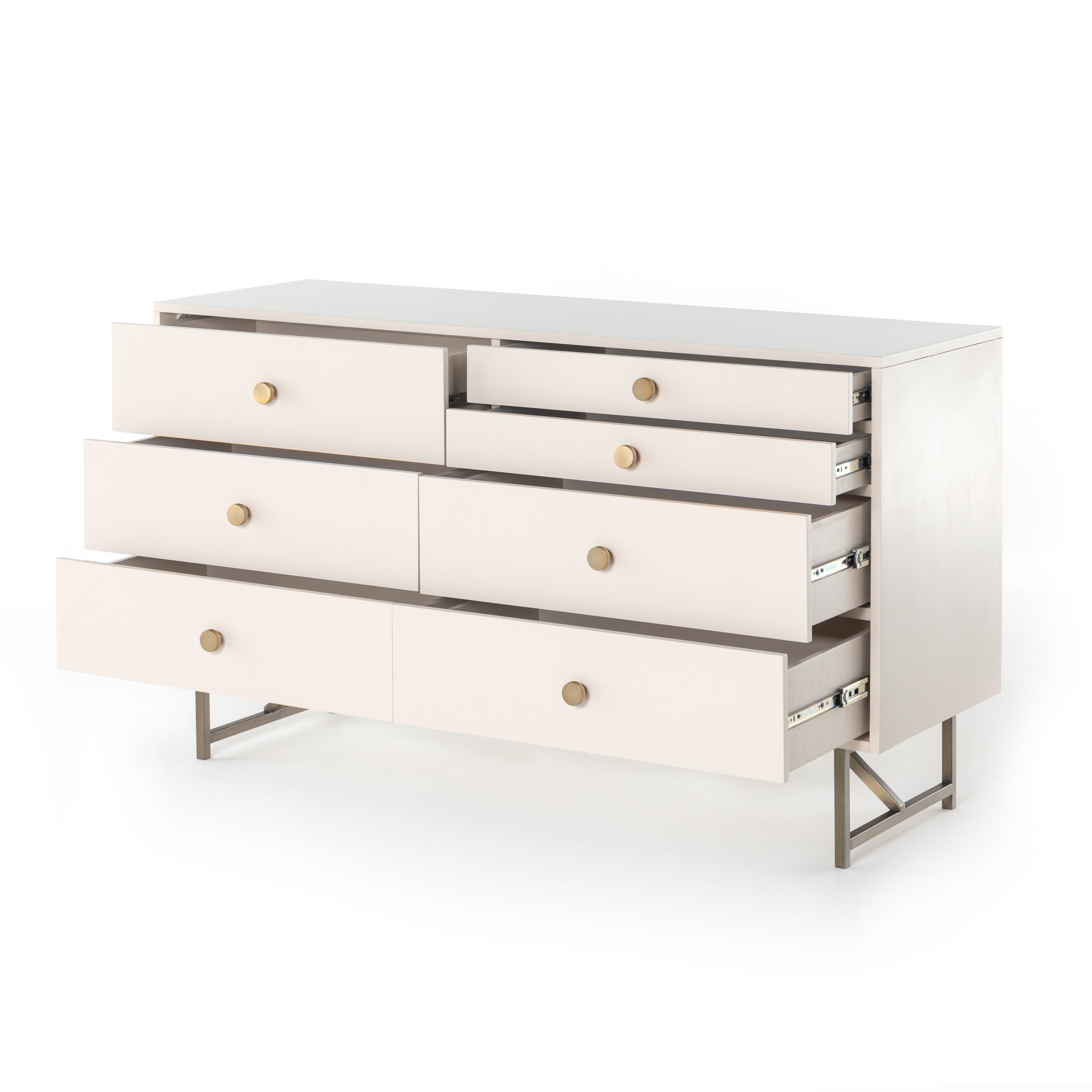 Featuring Van 7 Drawer Dresser - Matte Alabaster by Four Hands at Amethyst Home. This Van 7 Drawer Dresser - Matte Alabaster is finished in a dreamy off-white and aged-brass finished hardware to finish the look. This features five spacious drawers and two smaller velvet-lined drawers perfect for storing your favorite jewelry. 
Overall Dimensions: 58"W x 19".  Amethyst Home provides interior design, new home construction design consulting, vintage area rugs, and lighting in the Portland metro area.