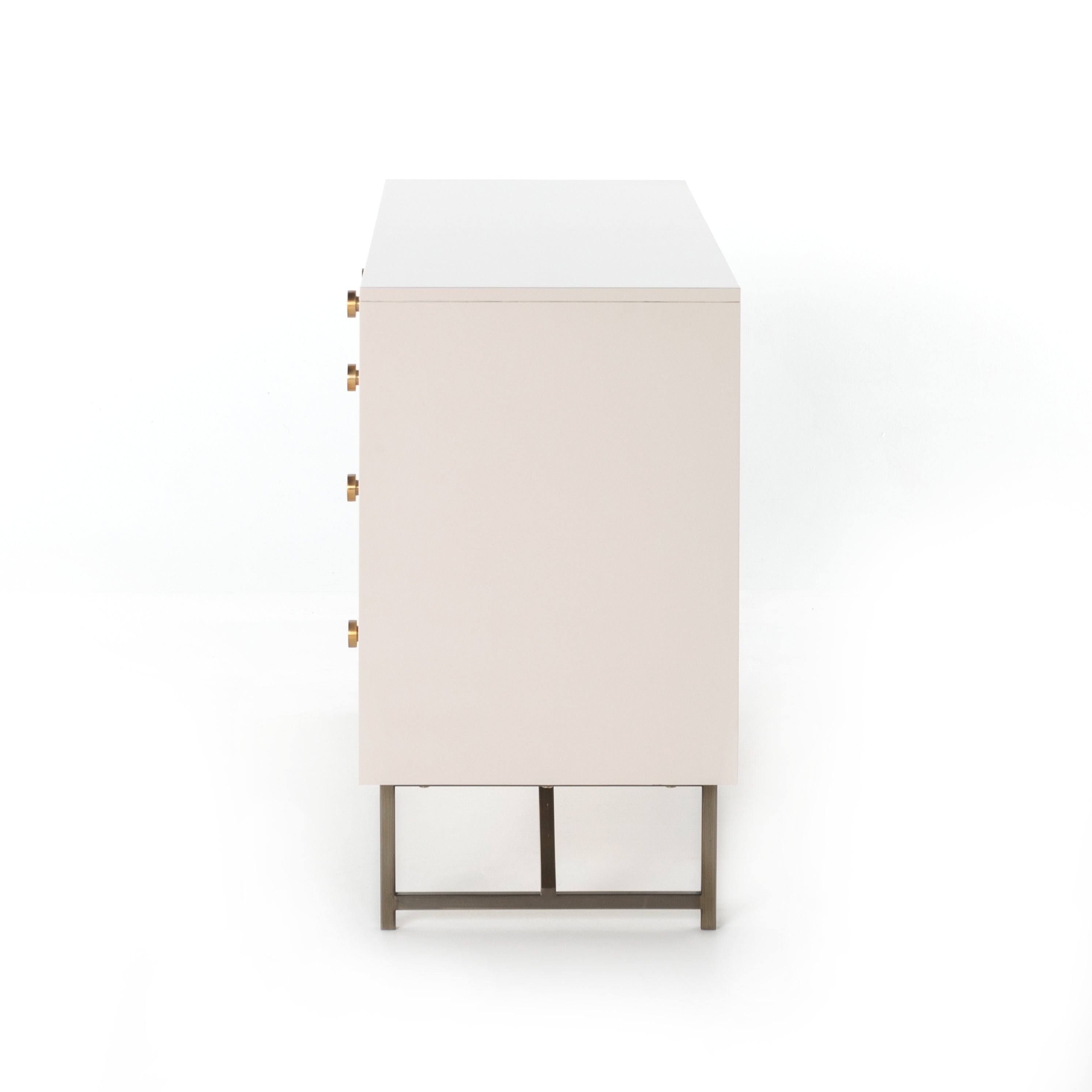 Featuring Van 7 Drawer Dresser - Matte Alabaster by Four Hands at Amethyst Home. This Van 7 Drawer Dresser - Matte Alabaster is finished in a dreamy off-white and aged-brass finished hardware to finish the look. This features five spacious drawers and two smaller velvet-lined drawers perfect for storing your favorite jewelry. 
Overall Dimensions: 58"W x .  Amethyst Home provides interior design, new home construction design consulting, vintage area rugs, and lighting in the Los Angeles metro area.