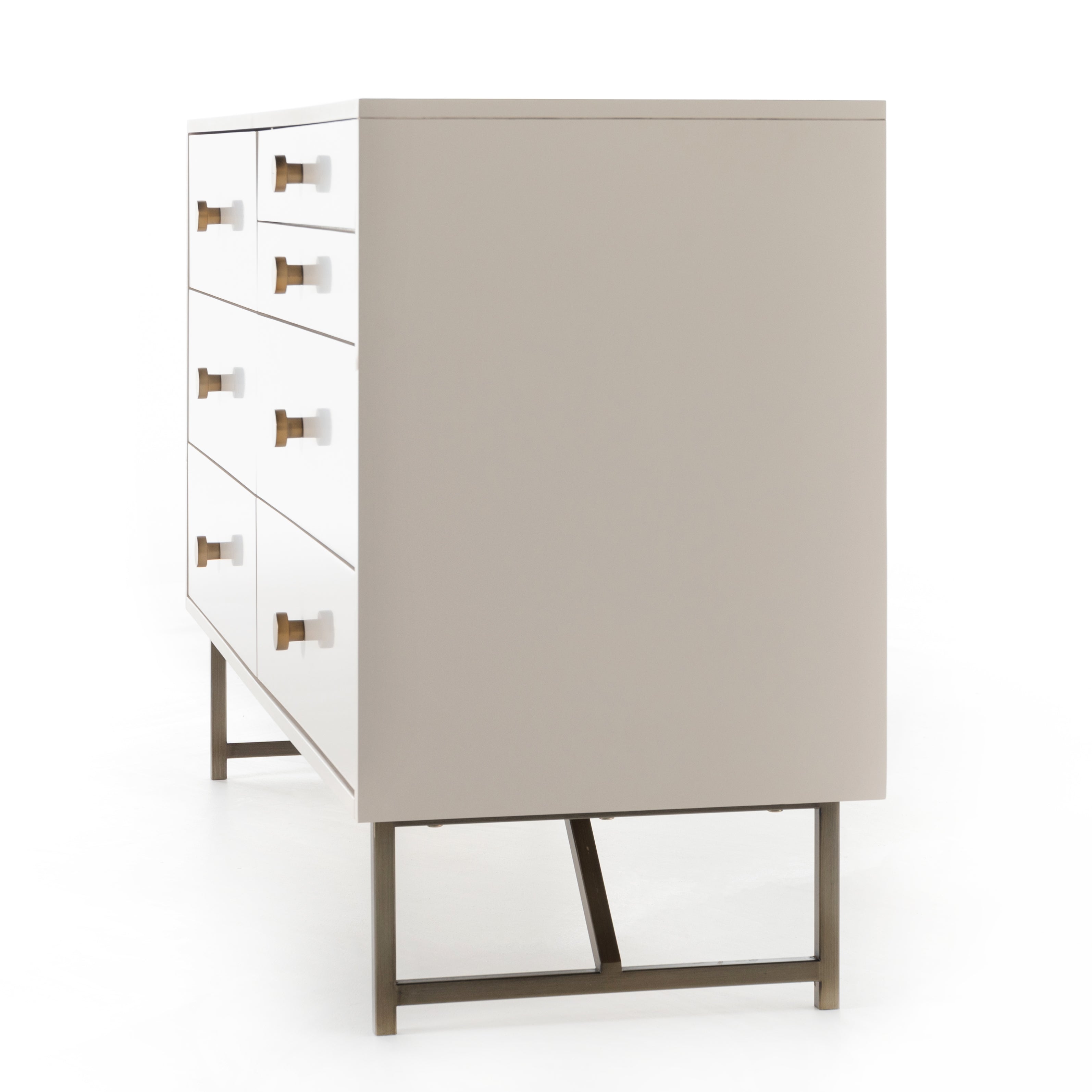 Featuring Van 7 Drawer Dresser - Matte Alabaster by Four Hands at Amethyst Home. This Van 7 Drawer Dresser - Matte Alabaster is finished in a dreamy off-white and aged-brass finished hardware to finish the look. This features five spacious drawers and two smaller velvet-lined drawers perfect for storing your favorite jewelry. 
Overall Dimensions: 58"W x.  Amethyst Home provides interior design, new home construction design consulting, vintage area rugs, and lighting in the Laguna Beach metro area.