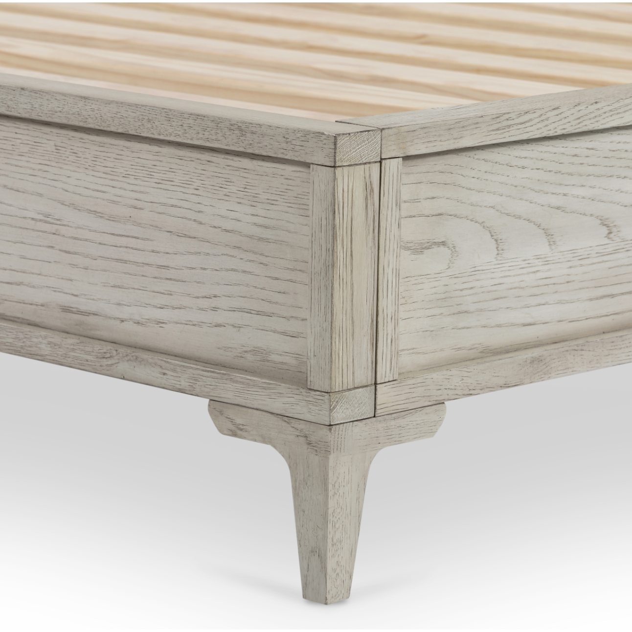 Finished in a beautifully light vintage white this Viggo Bed is a low, clean-lined oak bed featuring inset panel detailing on head and foot boards plus side rails, for an elegant, angular look for any bedroom. 