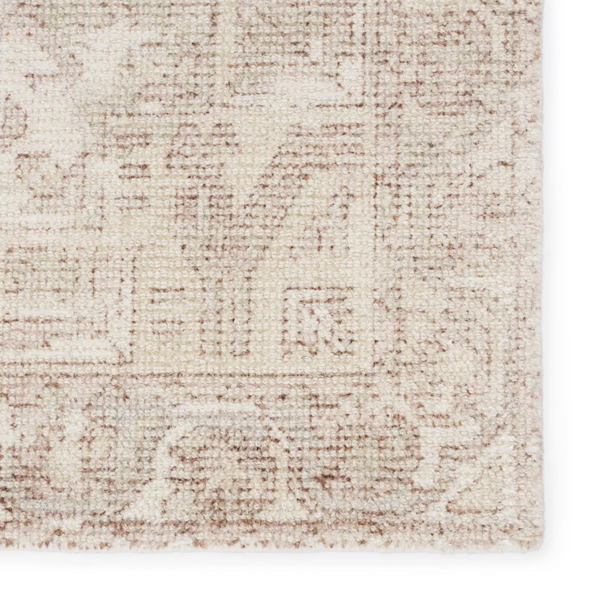 The handwoven Blythe Arlowe Silver Birch / Winter White Area Rug by Jaipur Living  features a cut-loop pile and soft-yet-textured feel. The blend of natural wool and luxe rayon made from bamboo grounds spaces with soft, inviting texture.