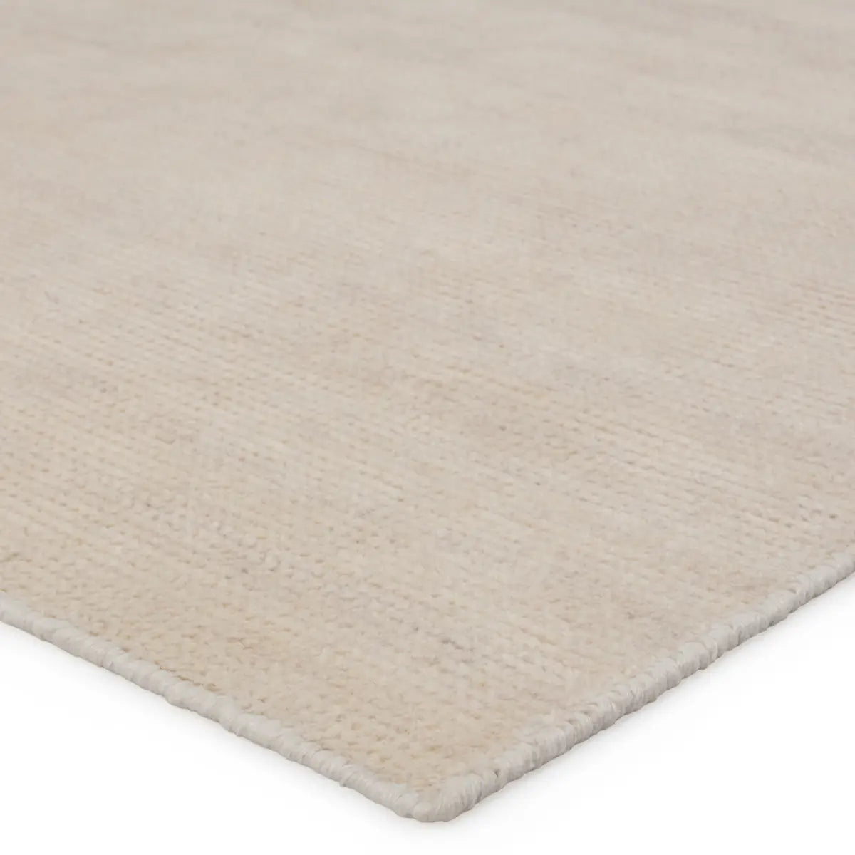 The eco-friendly Rebecca Light Gray Area Rug by Jaipur Living delivers a fresh accent to patios, kitchens, and dining rooms with its ultra-durable PET yarn hand-woven construction. The cream colorway with hints of brown lends a modern and sleek tone to any home.