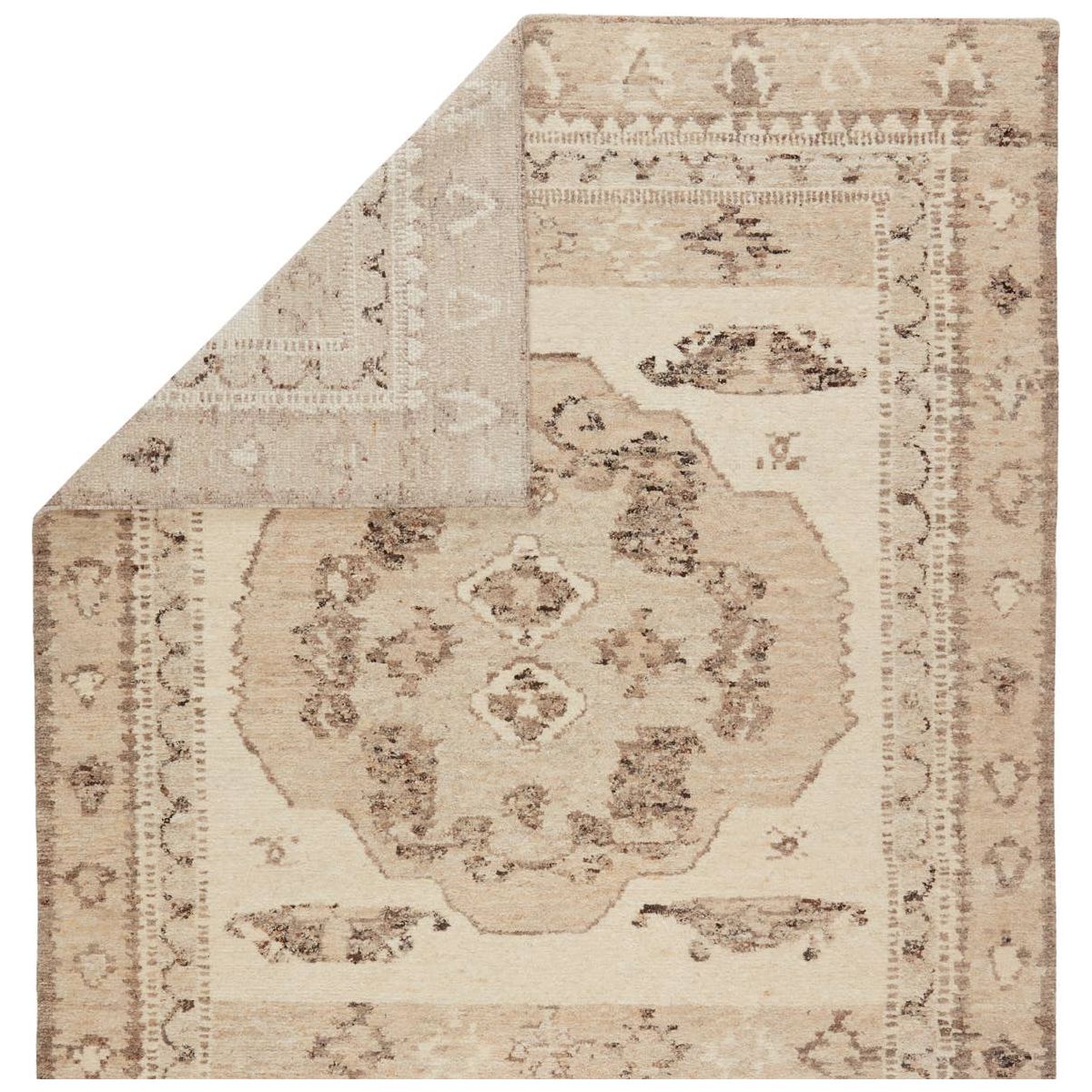 The inviting and traditionally inspired Repose collection marries stunning artisan craftsmanship and the beauty of natural, undyed wool. The Sherpa-like, hand-knotted construction of the Solna area rug boasts a plush texture underfoot and is perfect for adding warmth and coziness to a space. The neutral gray, brown, beige, and ivory tones ground the Kars-style motif with effortless versatility.  Hand Knotted 100% Wool RPS01