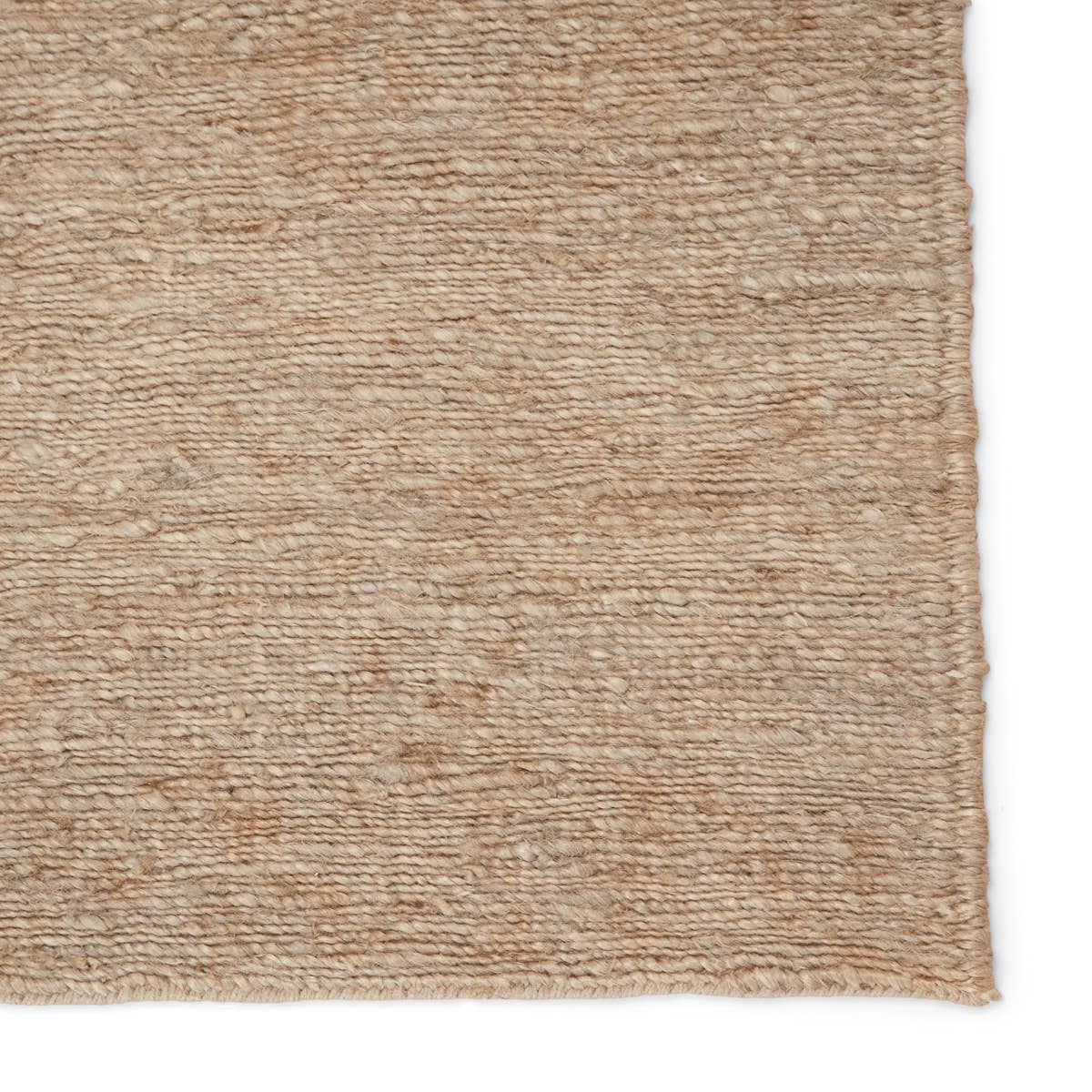 Featuring Twisted Jute Rug by Jaipur Living at Amethyst Home. The Twisted Jute collection lends rich texture and organic allure to modern homes. The Linden area rug features a fine, single-line Sumak knotting technique for an exquisite feel and craftsmanship. This dark taupe natural area rug is the perfect accent for sophisticated spaces in want of a groun.  Amethyst Home provides interior design, new home construction design consulting, vintage area rugs, and lighting in the Charlotte metro area.