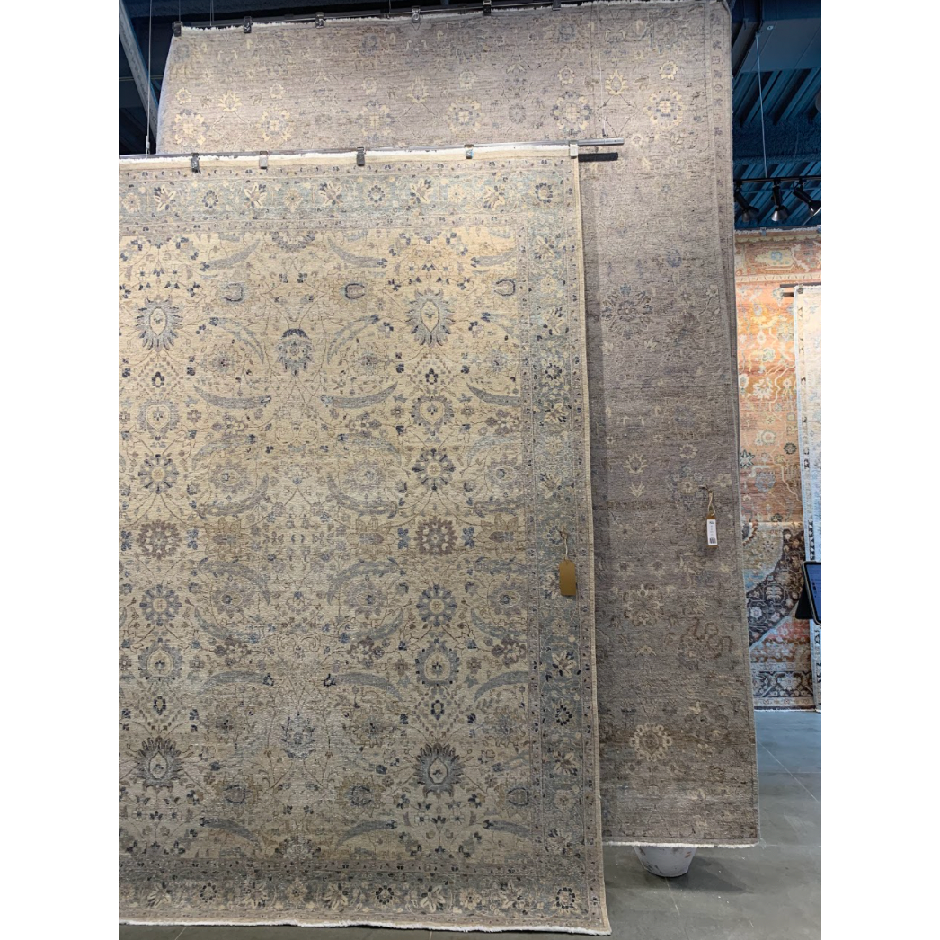Featuring Tierzah Merey Hand-Knotted Rug by Jaipur Living at Amethyst Home. The vintage-inspired Tierzah Merey Area Rug features an antiqued wash and intricate traditional designs. The Merey wool rug boasts a Persian knot construction and tonal gray and soft beige palette that complements any style. This artisan-made rug features fringe trimmed details for.  Amethyst Home provides interior design, new home construction design consulting, vintage area rugs, and lighting in the Park City metro area.