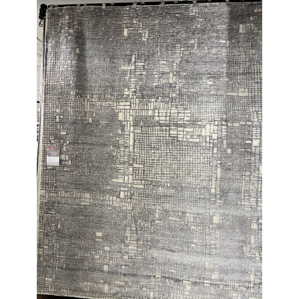 The Atlas Grey / Natural Area Rug by Loloi, or ATL-04, showcases striking contemporary patterns with a sophisticated color palette. Bold yet approachable, Atlas' muted linear designs create a sense of refined movement. Hand Knotted. Wool | Nylon