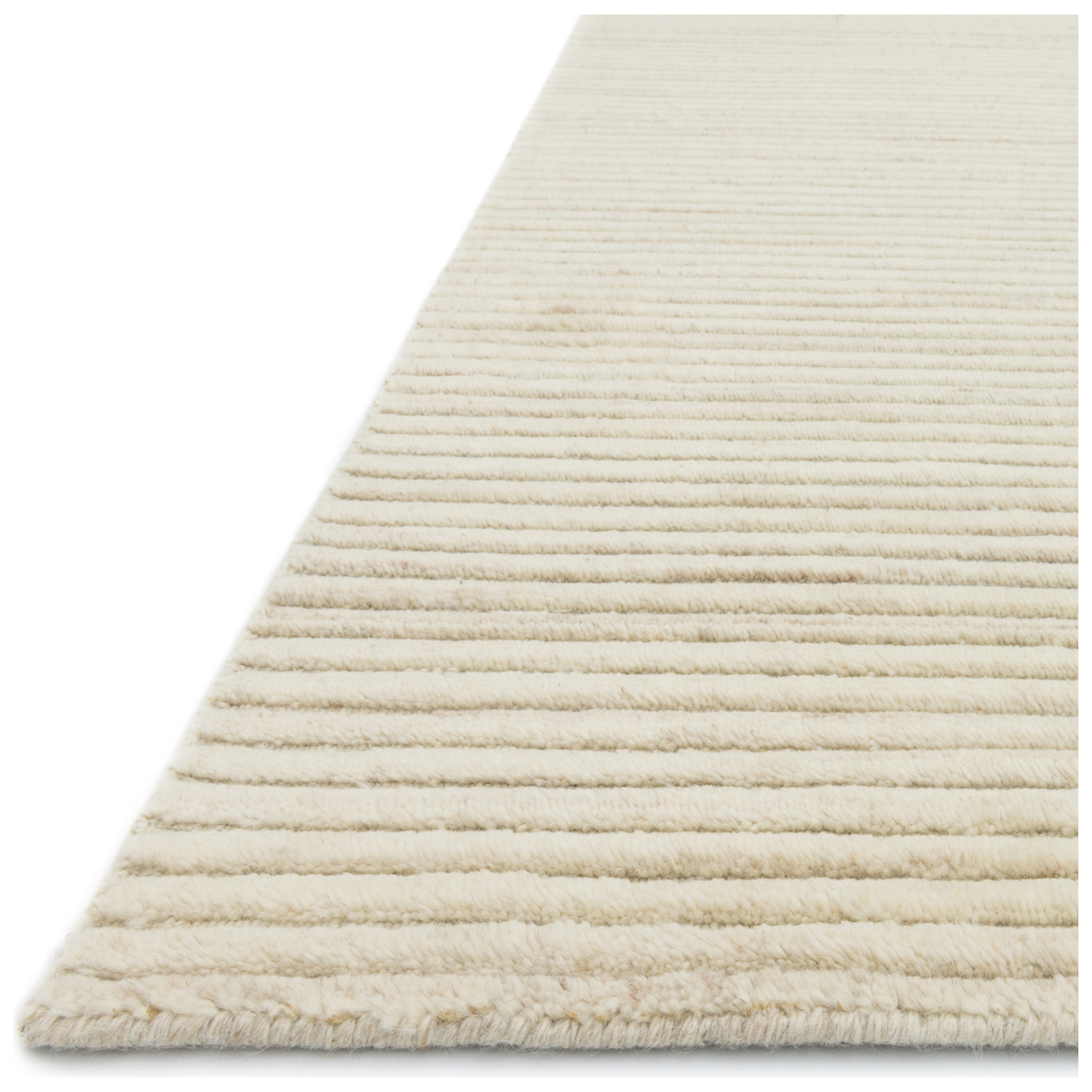 Natural beauty is expressed in an understated fashion with the Hadley Collection, an eco-friendly collection of 100% undyed wool. Loom knotted, the Hadley features an intriguing cut pile and loop combination which adds distinctive texture to these handsome and durable designs. Also, the muted colors fit easily with a variety of interior styles while still earning notice with raw elegance.  Hand Loomed 100% Wool HD-06 Ivory