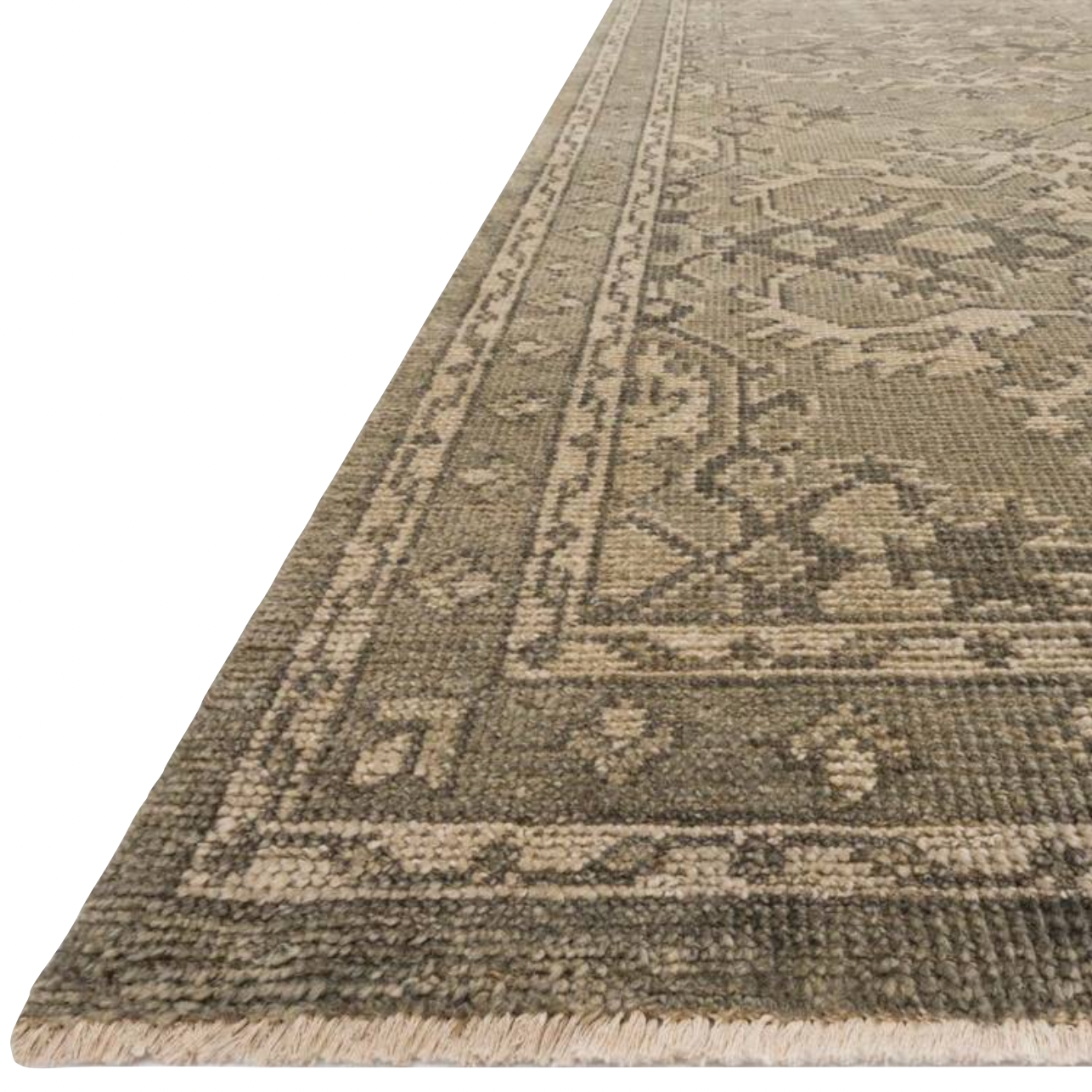 Bring a touch of antiqued beauty into your home with the Heirloom Fog / Fog Area rug from Loloi. This wool rug tastefully honors the art of hand knotted rugs. The rug evokes a sense of unique sophistication with its traditional Serapi rug color palettes and vintage design.  This rug would be perfect for a living room, dining room, bedroom, hallway or kitchen runner with it's patterns and calming tones for your home.  Hand Knotted 83% Wool | 17% Cotton HQ-03 Fog / Fog