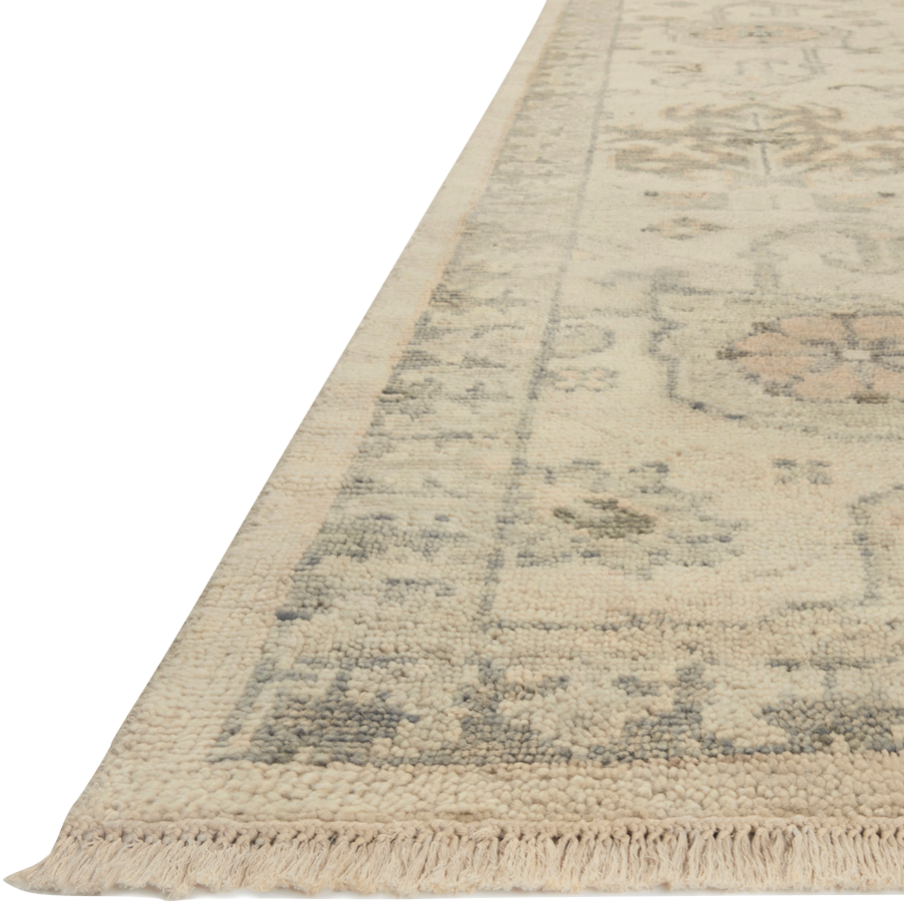 The Helena Beige / Stone HEL-06 rug from Loloi is hand-knotted of 100% wool, refined, yet versatile for any home. The Helena rug combines weathered tones and worldly patterns for a beautiful grounding element in any room.