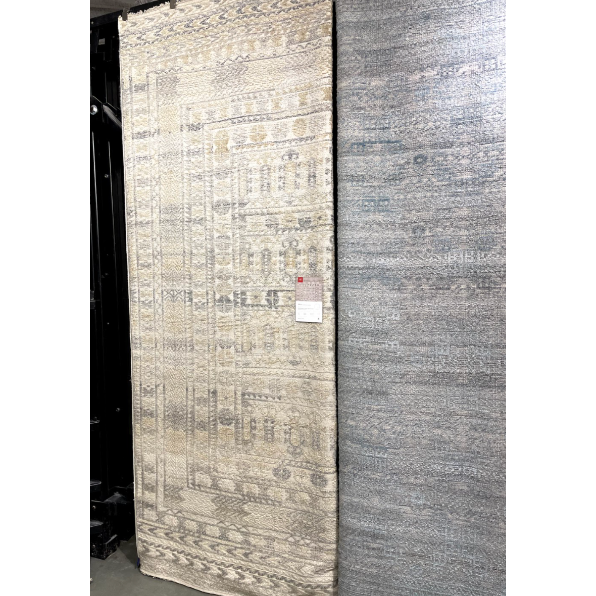 The Idris Ivory/Taupe area rug from Loloi is meticulously hand-knotted of viscose and wool. You will love this rug because the rug is:  Perfect for entryways, living rooms, and bedrooms Easy to clean and maintain Gorgeous with the intricate pattern and patina Warms up any room with the high / low pile Hand-Knotted 70% Viscose | 30% Wool ID-04 Ivory/Taupe