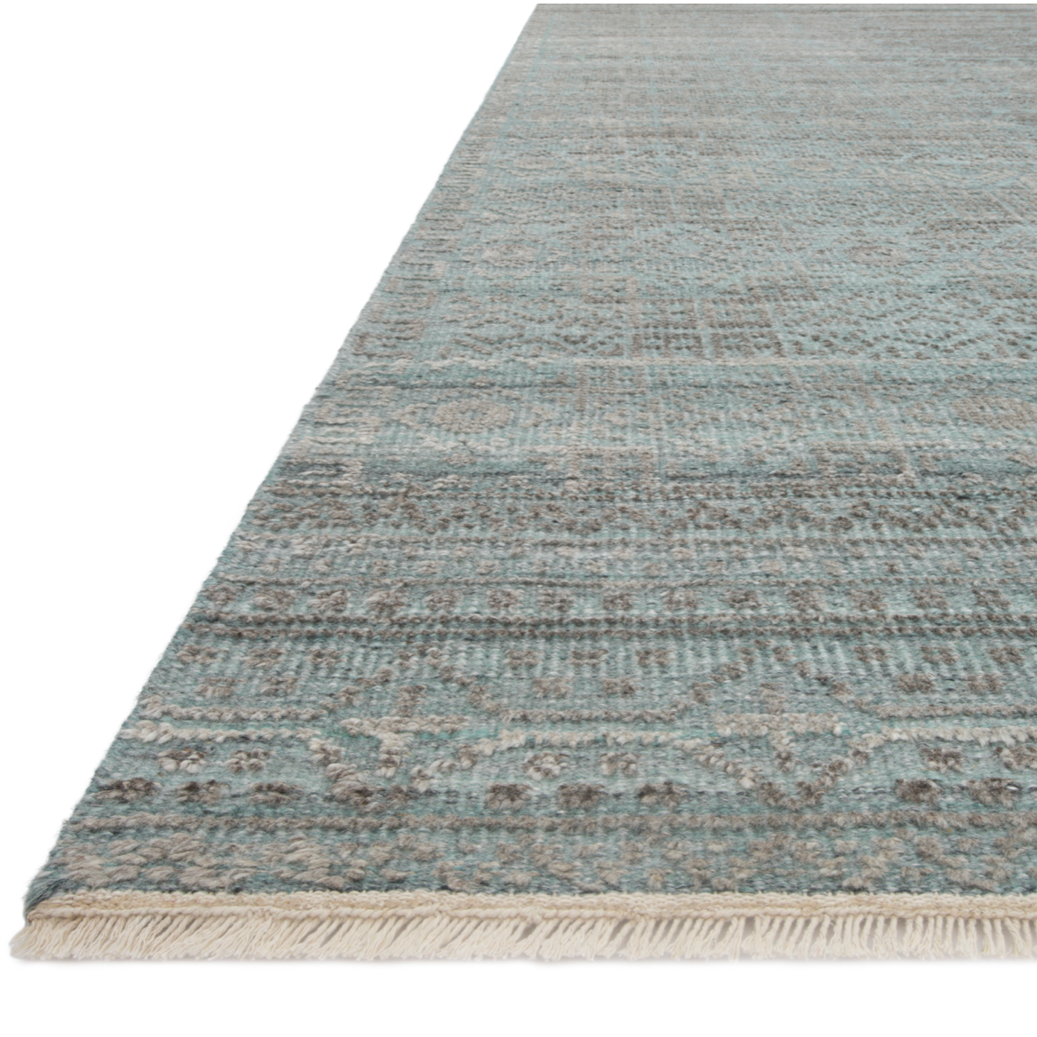 Both timeless and modern, the Idris area rug collection from Loloi is meticulously hand-knotted of viscose and wool. The tonal series features an elevated texture, accentuating the pattern in every piece.  Hand-Knotted 70% Viscose | 30% Wool ID-03 Ocean/Smoke