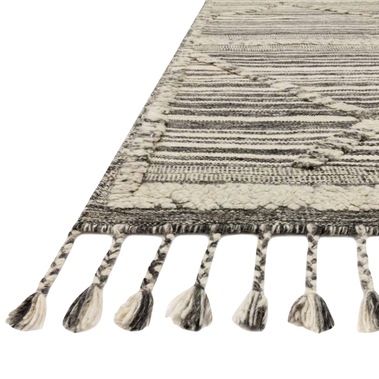 A new take on Moroccan style rugs, the Iman Collection is hand-knotted of 100% wool pile by skilled artisans in India. The surface features linear and braided details, creating tonal variations that make each piece unique. Plus, each design is finished with playful fringe.  Hand Knotted 100% Wool Pile IMA-01 Ivory / Charcoal