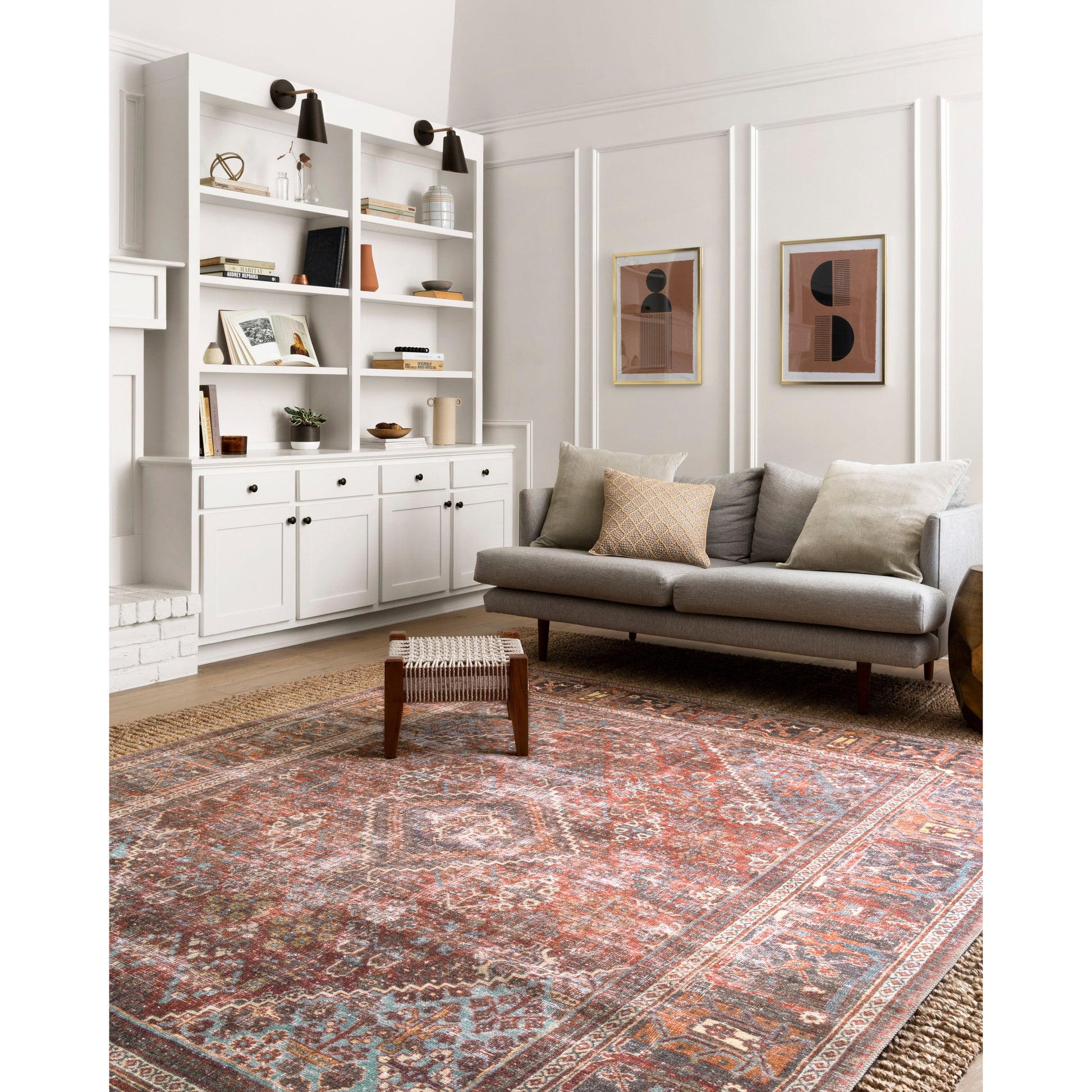 The Loloi Loren Brick / Multi Area Rug, or LQ13, offers vintage hand-knotted looks at an affordable price. This power loomed rug is perfect for living rooms, dining rooms, or other high traffic areas. These printed designs provide a textured effect by portraying every single individual knot on a soft polyester base.