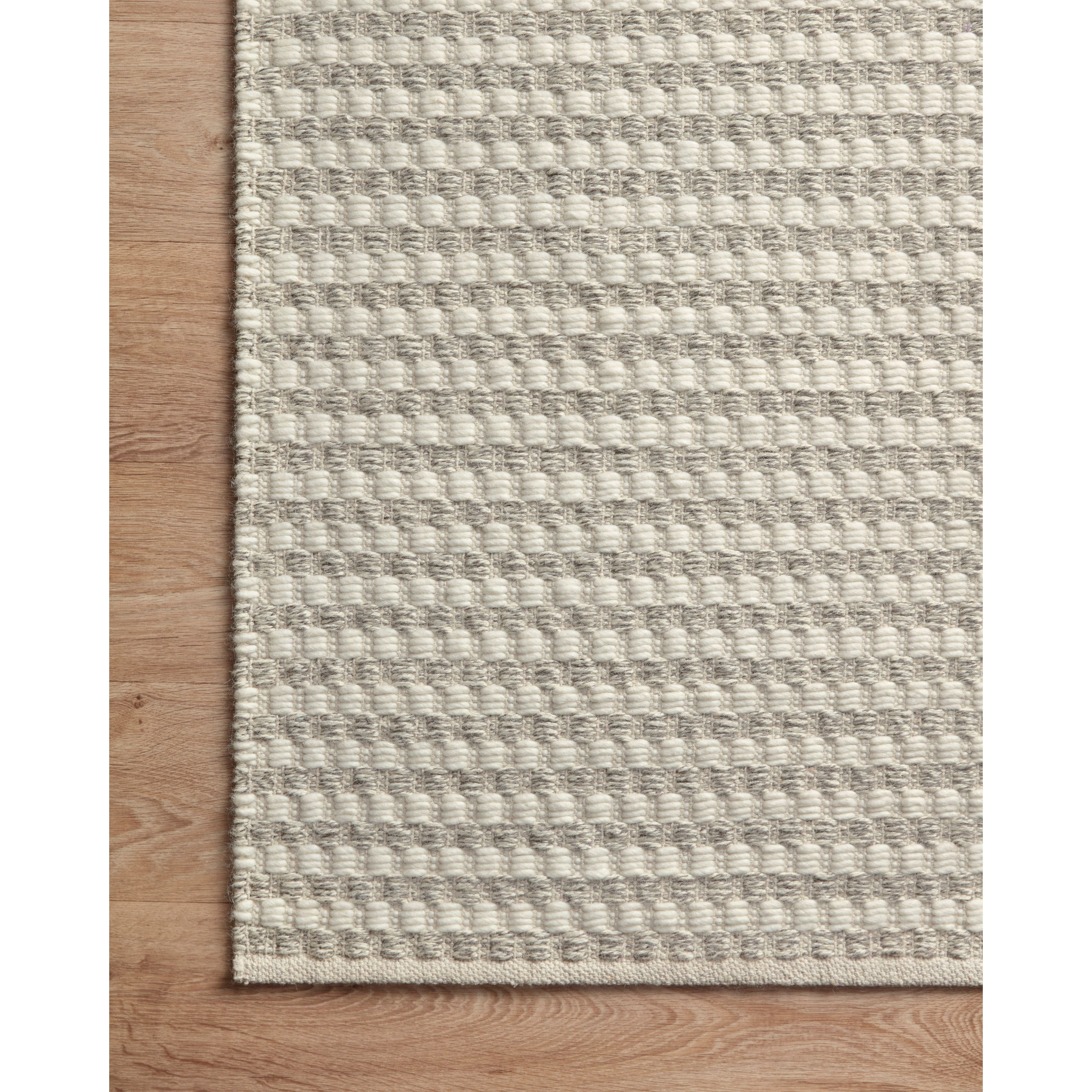 Hand-loomed of wool and cotton in India, the Ojai Collection for Amber Lewis x Loloi offers a series of understated neutrals that feels at once refined and relaxed. Ojai serves a timeless foundation that is sure to bring an elevated yet comfortable feel to any room. Ojai is also GoodWeave-Certified, ensuring our commitment to ethical product and the support of weavers' communities. OJA-01 AL Ivory / Stone