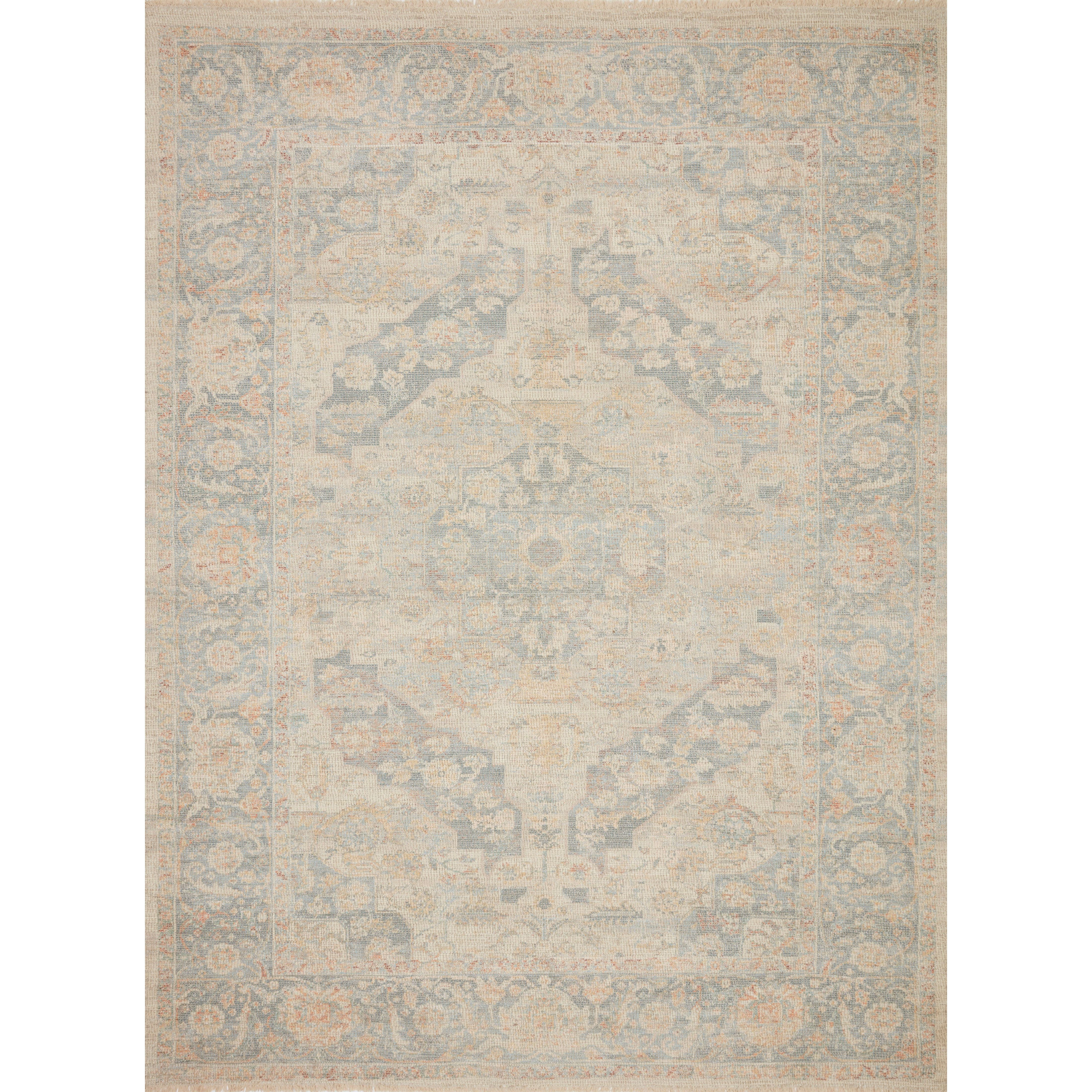 Hand-woven by skilled artisans, the Priya Bone / Bluestone Area Rug from Loloi offers beautiful tonal designs accentuated by a carefully curated color palette. Delicate yet strong, Priya is an instant classic made for today's home.  Hand Woven 51% Cotton | 29% Polyester | 12% Viscose | 8% Wool PRY-08 Bone/Bluestone Colors: Blue, Orange, Beige