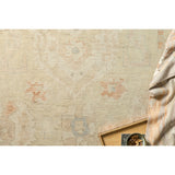 Hand knotted of 100% wool by skilled artisans, the Loloi Vincent Pebble / Pebble Area Rug, or VC-06, offers the look of a well-worn antique rug in a modern day color palette. Each exquisite piece undergoes a weeks-long antique washing process which fades the pattern and color beautifully. 