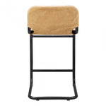 This Baker Counter Stool - Sunbaked Tan Leather has an ultra-supple tan leather seat, supported by a thick black iron frame. Sure to complete the look for any kitchen, island, or other area!   Size: 19"W x 21"D x 35"H