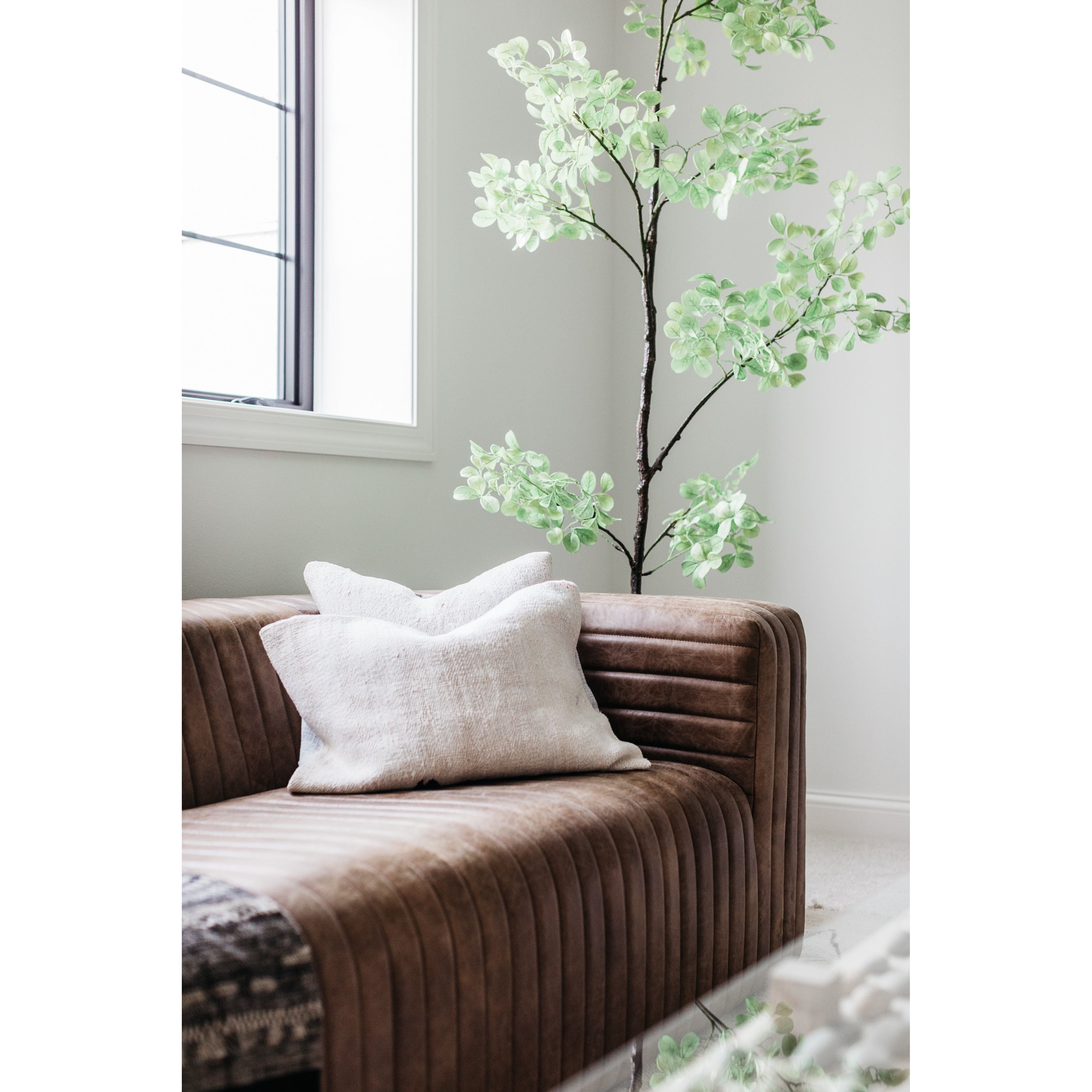 Wrapped in premium, channel-stitched top-grain leather and with spacious seating for 3, this Castle Sofa Cappuccino is a dapper piece to add to any living room or lounge area. With extra deep cushion spring support, this is perfect for unwinding after a long day in.   Dimensions: 94.5"W x 40.5"D x 27.5"H  Seat Height: 17" Back Height: 10" Arm Height: 10" 