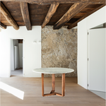 With a solid Satwaria marble tabletop, the Jinxx Dining Table - Brown showcases the best of nature's work. Solid Acacia legs form an ergonomic base that allows 4-6 people to sit comfortably around the table.  Size: 48"W x 48"D x 30"H Materials: White Satwaria Marble Top, Solia Acacia Base, MDF