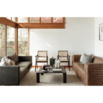 We love the unique legs found on this Post Coffee Table - Black Oak. Made from solid oak, this coffee table sits lower to the ground, inviting more communication on its sturdy dowel legs.  Dimensions: 36"W x 36"D x 13"H Materials:  Solid Oak