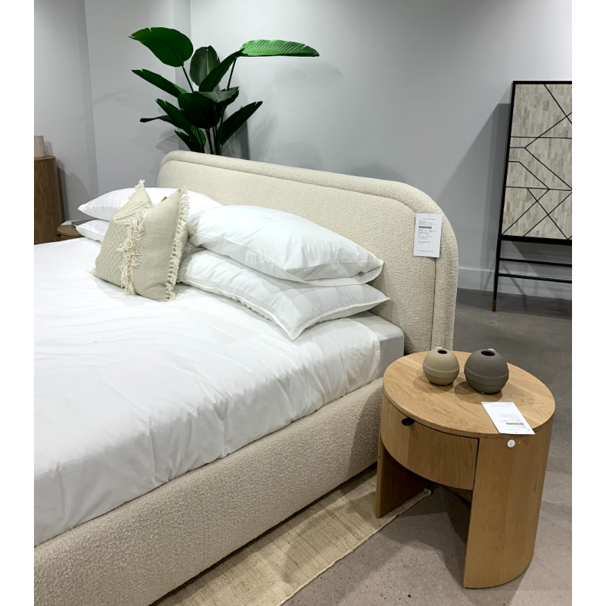 Made from solid oak and a natural finish, the Theo Nightsand gives us all the natural, earthy vibes. The drawer makes this an extremely function, contemporary piece to add to your room.   Size: 19"W x 19"D x 18.5"H Material: Solid Oak