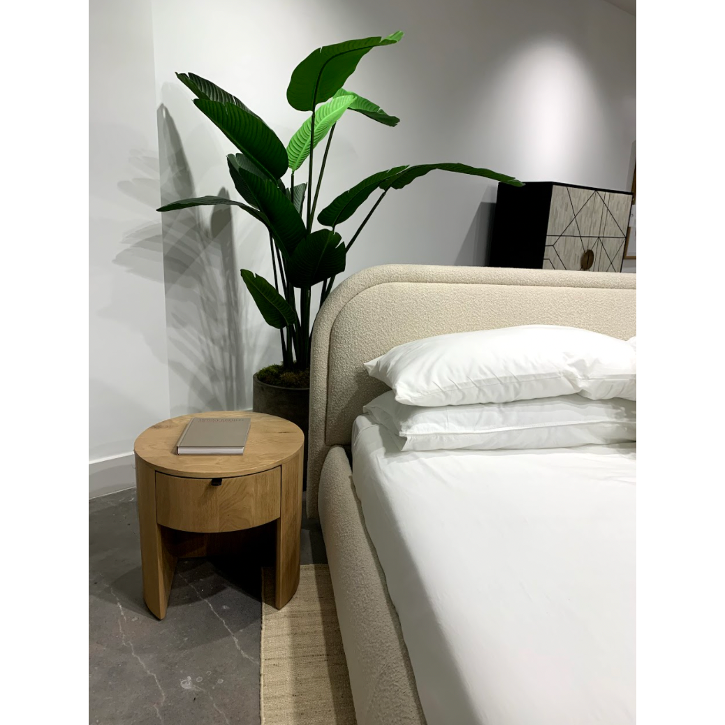 Made from solid oak and a natural finish, the Theo Nightsand gives us all the natural, earthy vibes. The drawer makes this an extremely function, contemporary piece to add to your room.   Size: 19"W x 19"D x 18.5"H Material: Solid Oak
