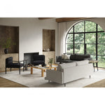 This Turner Leather Chair is a boldly blocked silhouette with swooped armrests, buttery soft top-grain leather, and solid ash wooden frame modernize this stately accent chair. The button-tufted cushion supports a gentle half-back, and a bonded leather support weave softens a wider seat underneath the feather + foam-filled cushion -- a comfy piece to add to any living room!  Size: 28.5"W x 30"D x 30"H